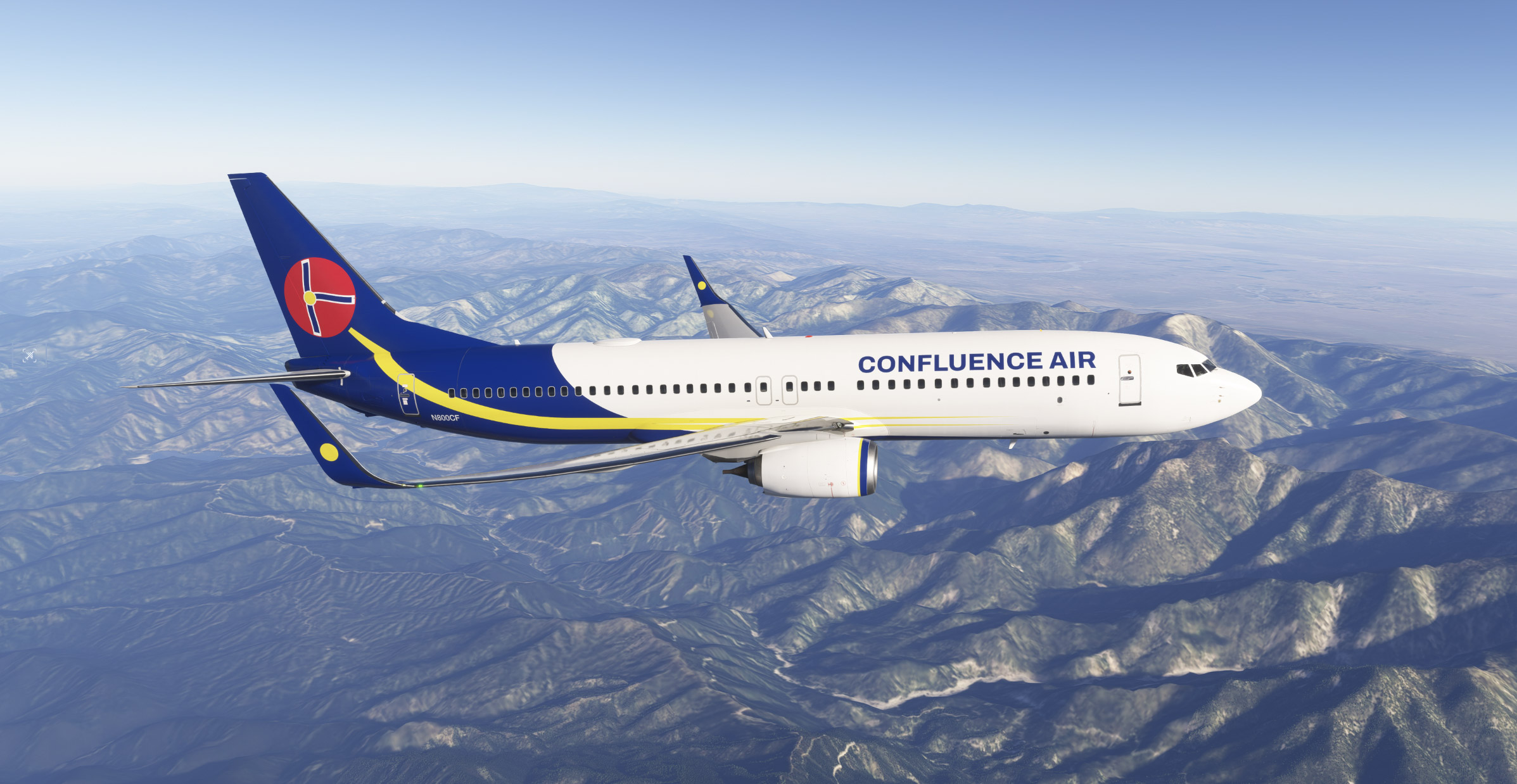 Confluence Air Boeing 737-800 in cruise above snow-covered mountain ridges